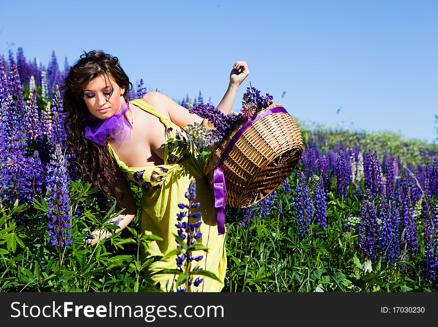 Woman In Plant Of Violet Wild Lupine