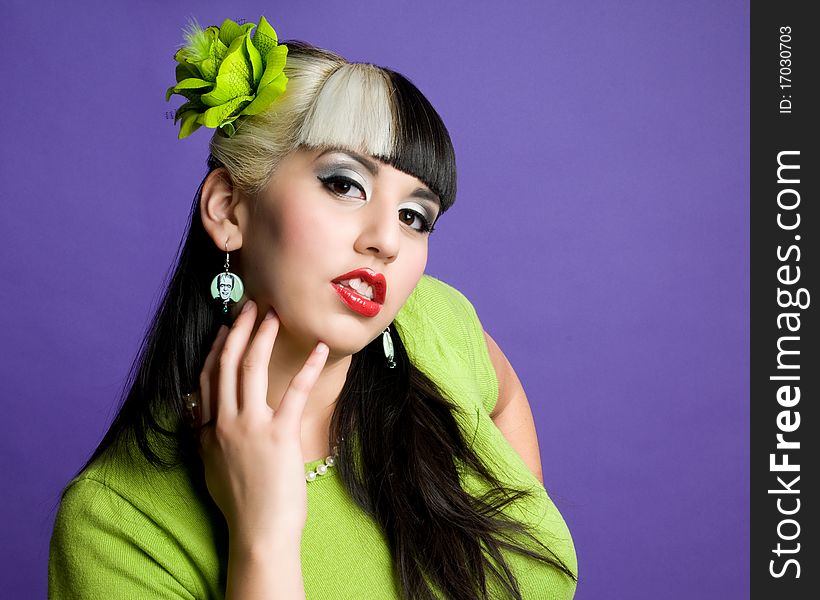 Asian girl wearing green sweater and green hair flower. Asian girl wearing green sweater and green hair flower