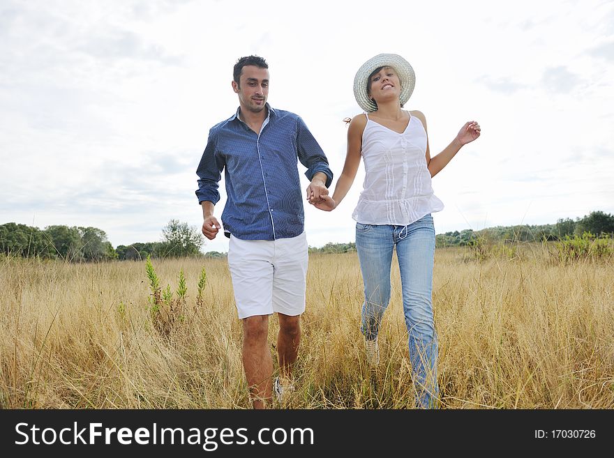 Happy Couple Enjoying Countryside Picnic