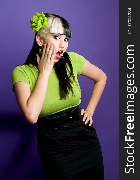 Asian girl wearing green sweater and green hair flower. Asian girl wearing green sweater and green hair flower