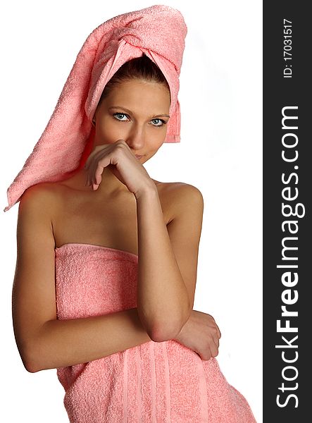 Relaxed clean woman with towel on head after spa salon