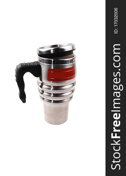 A handy stainless steel thermos coffee cup with a black plastic handle, for white background. A handy stainless steel thermos coffee cup with a black plastic handle, for white background.