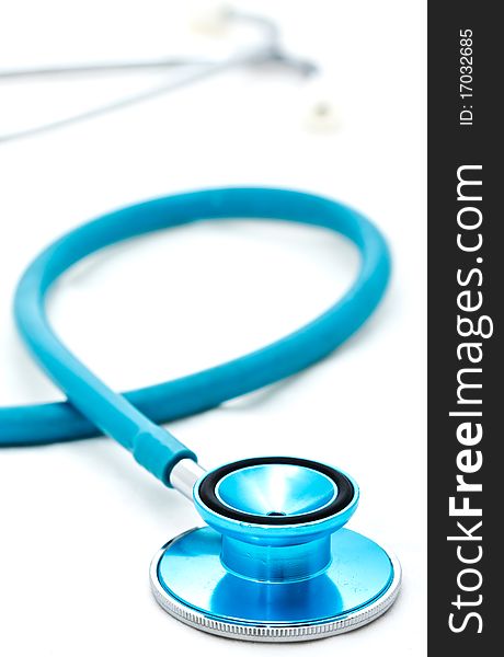 Blue stethoscope placed on white background