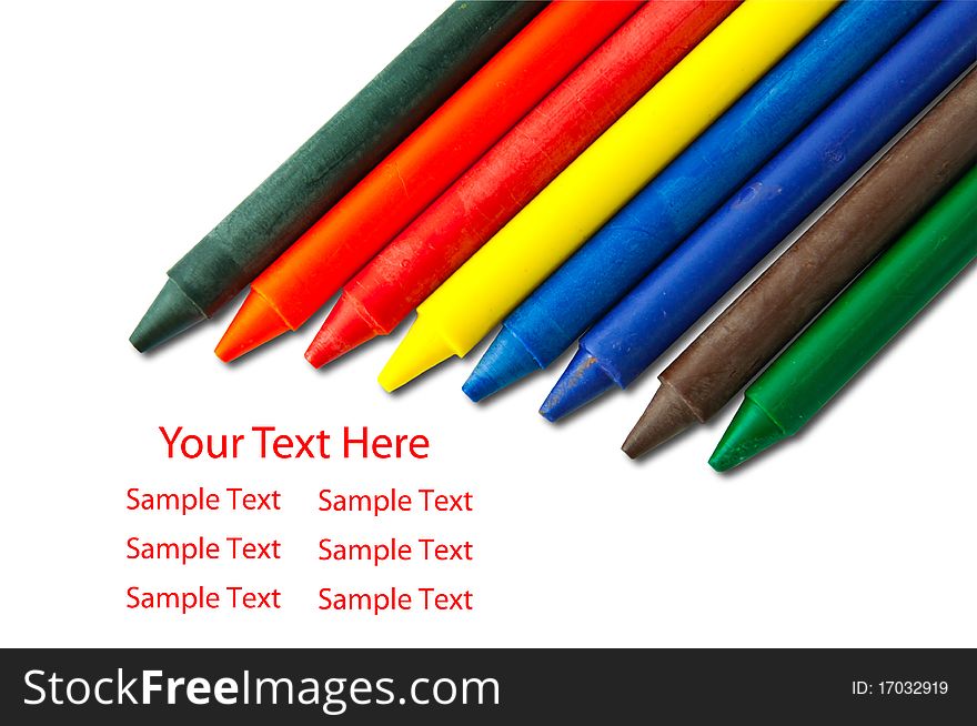 Colorful crayons on white with sample text