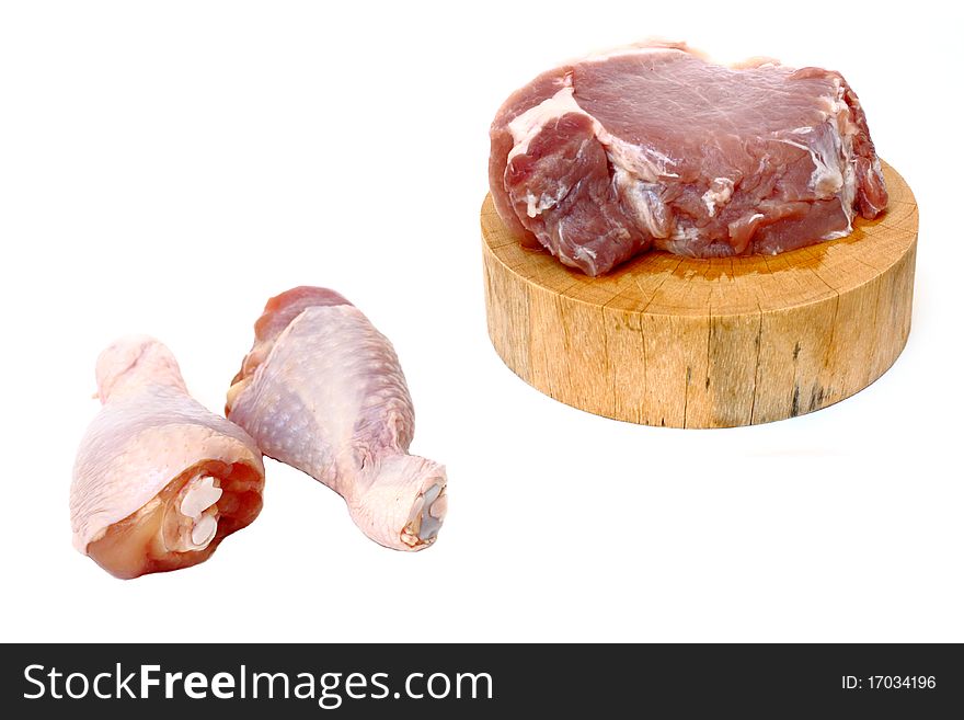 Raw pork and chicken isolated on white. Raw pork and chicken isolated on white