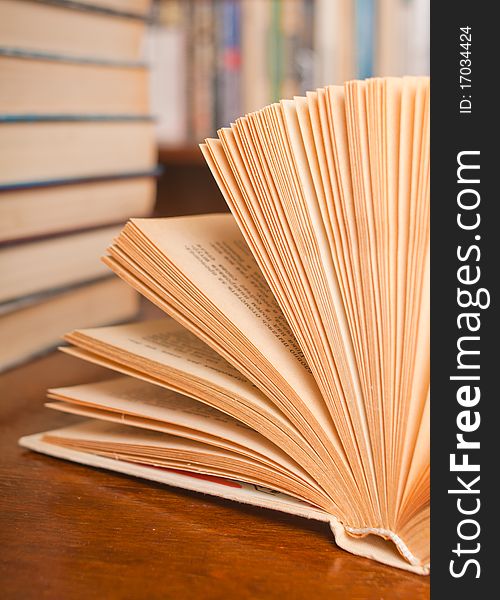 Closeup shot of opened book isolated on white background. macro. Closeup shot of opened book isolated on white background. macro.