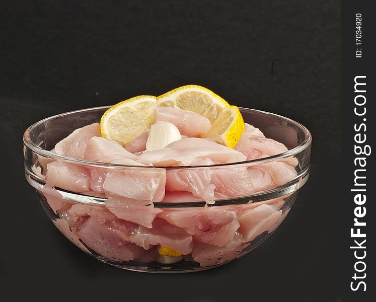 Raw sliced chicken meat