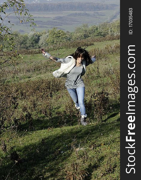 Happy teenager with hair flying having fun in nature. Happy teenager with hair flying having fun in nature
