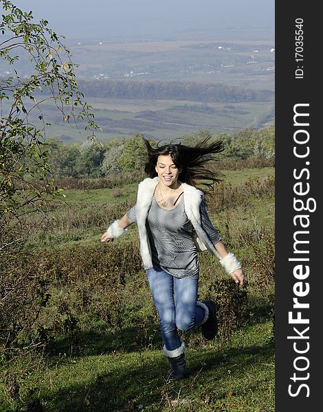 Happy teenager with hair flying  having fun in nature. Happy teenager with hair flying  having fun in nature