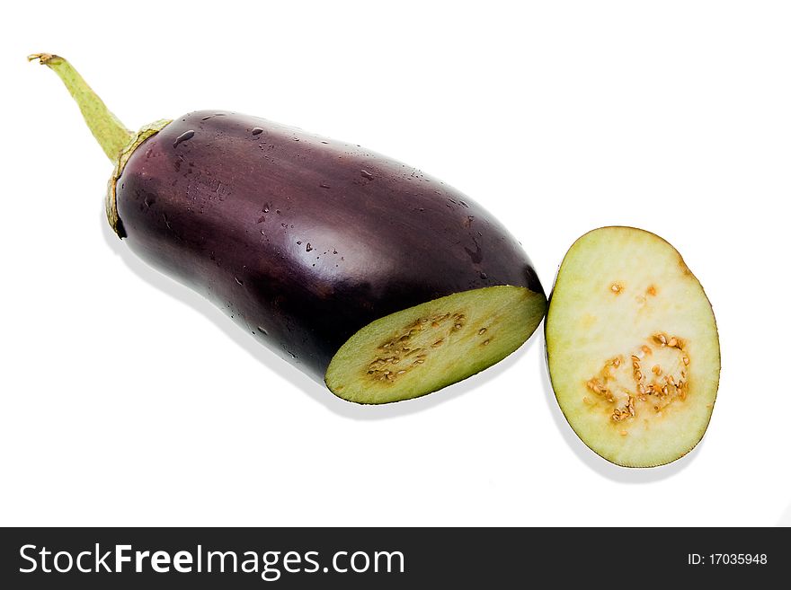The ripened eggplant from which cut off a slice. The ripened eggplant from which cut off a slice