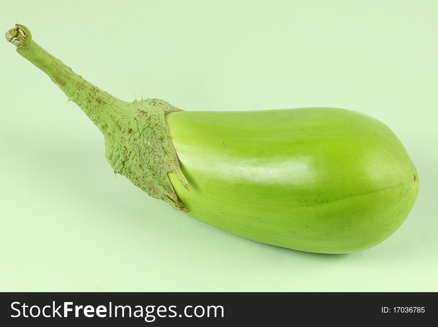 Aubergine isolated on green background