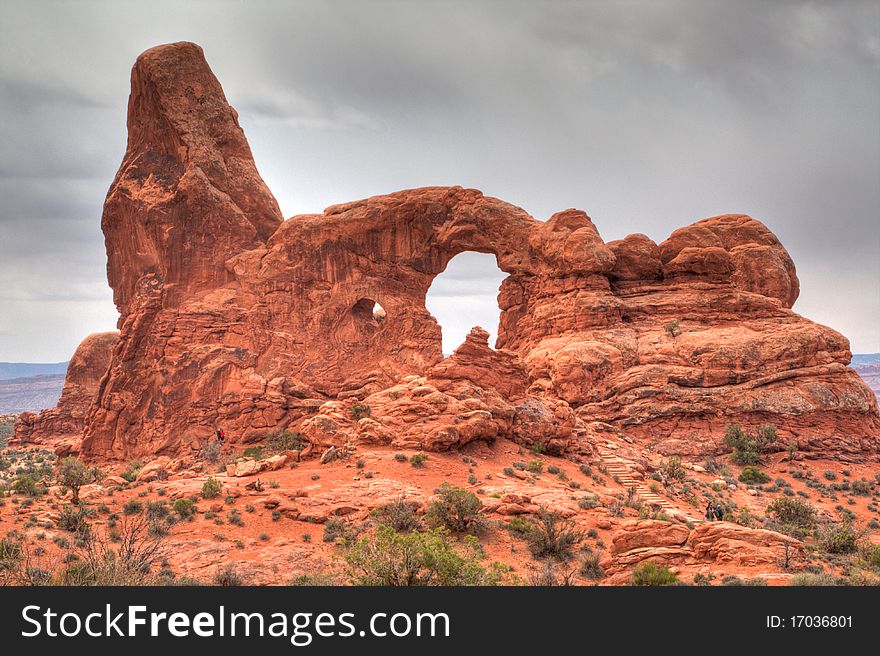 a coming storm appear on a sandstone arch in Arches National Park, Moab,Utah.USA