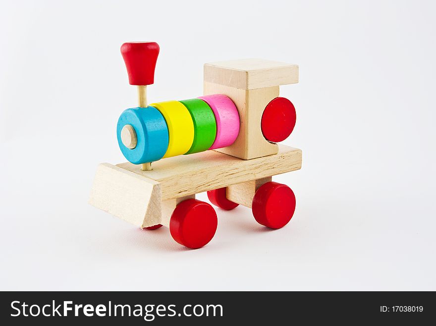 Wooden train toy isolated over white. Wooden train toy isolated over white