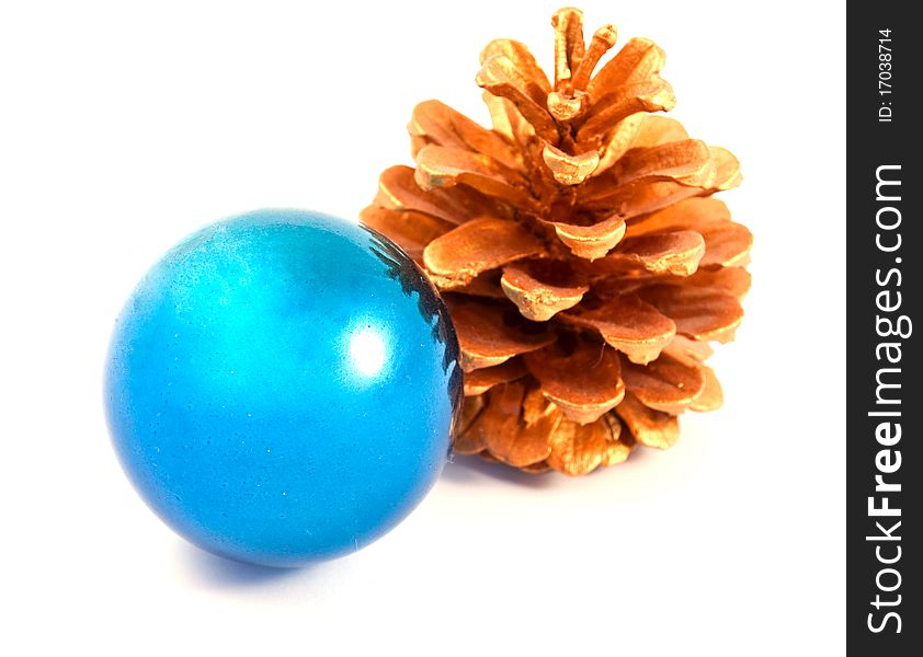 Christmas ball with a gold pine cone on a white background