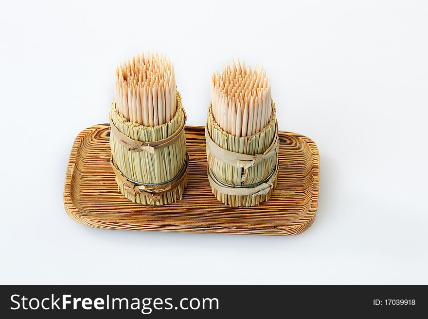 Wooden toothpicks on a white background