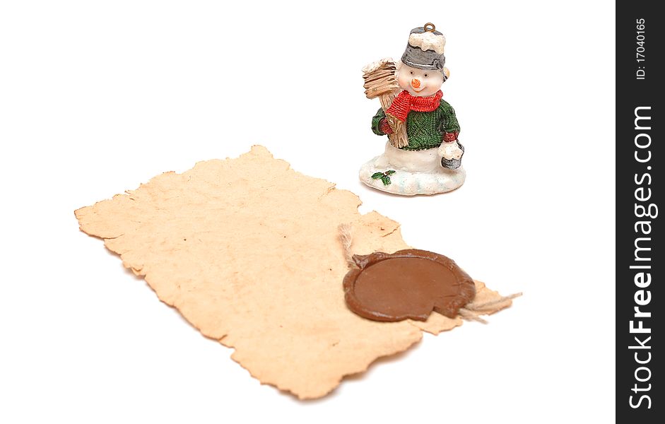 Christmas toy snowman and old paper wax seal