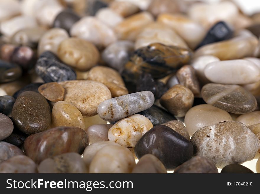 Colorful different little stones background