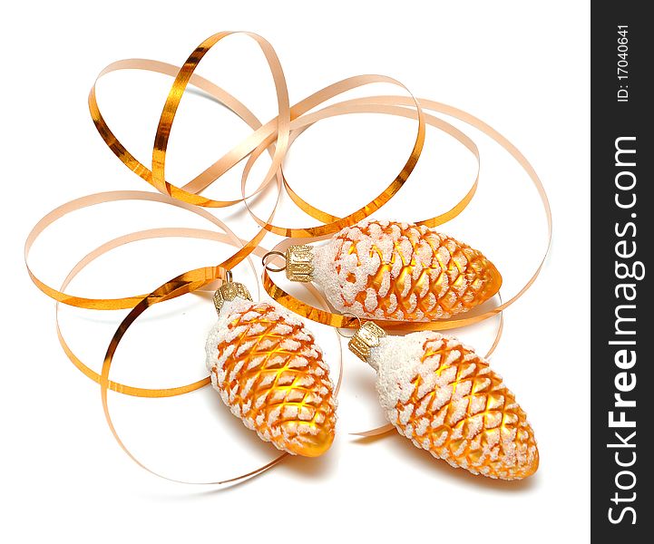 Christmas decoration - golden cone and ribbon on white background