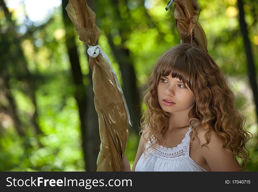 Pretty woman posing in forest. Pretty woman posing in forest