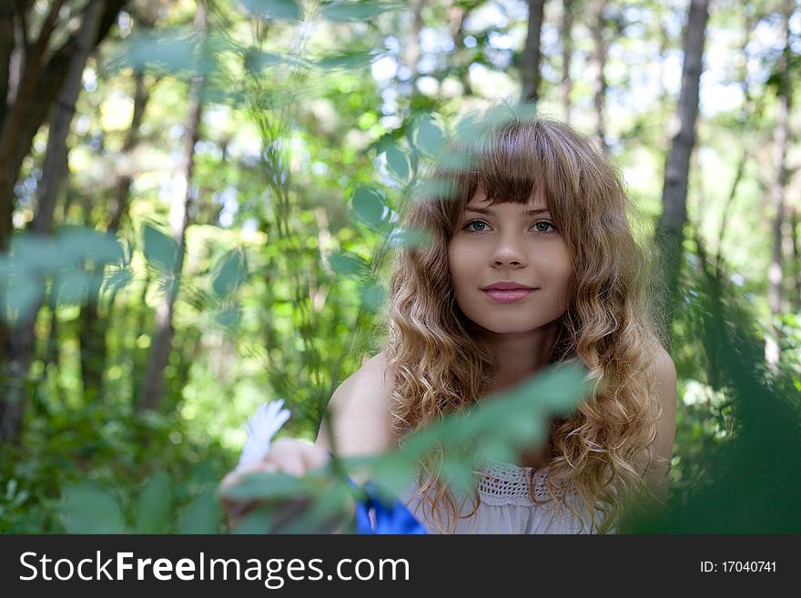 Pretty woman posing in forest. Pretty woman posing in forest