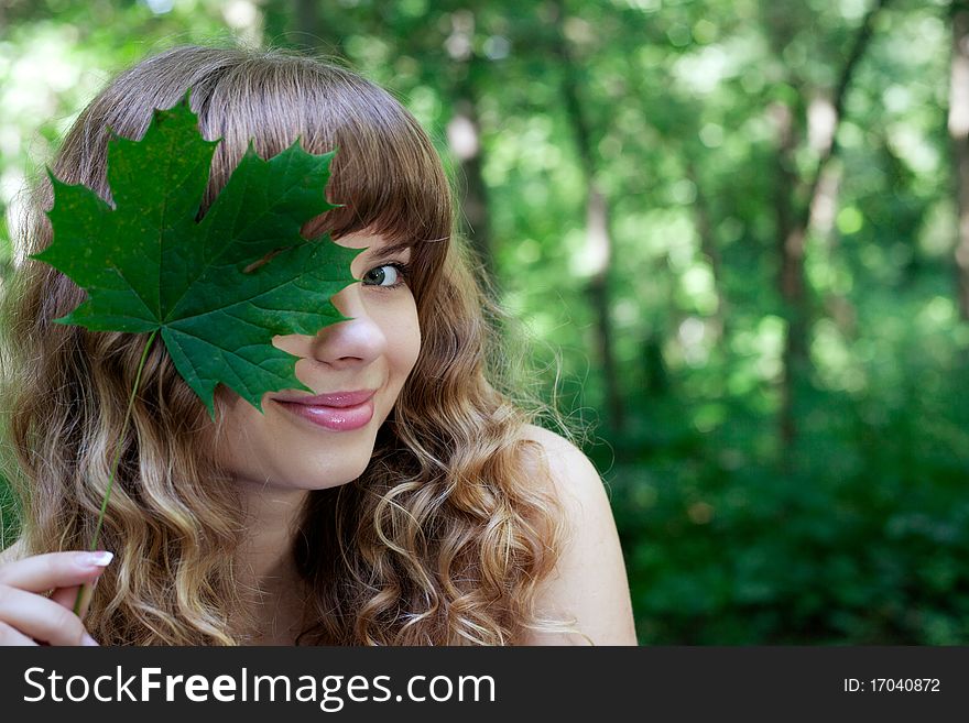 Pretty woman posing in forest. Pretty woman posing in forest