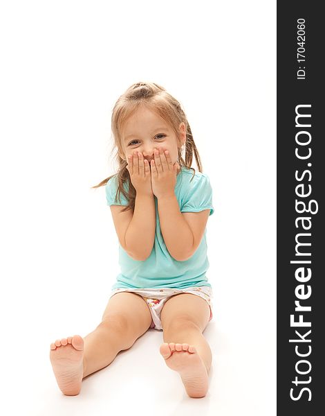 Young girl laughing to the camera on isolated white background.