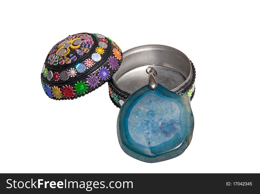 Precious stone necklace on a white open box. file contains clipping path. Precious stone necklace on a white open box. file contains clipping path