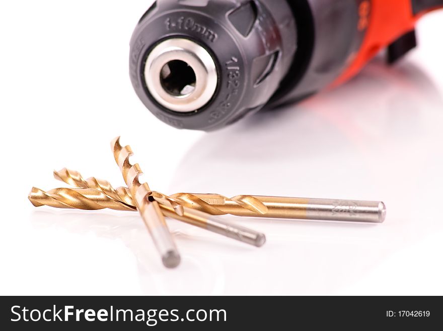 Drill Bits On White With Electric Screw Driver