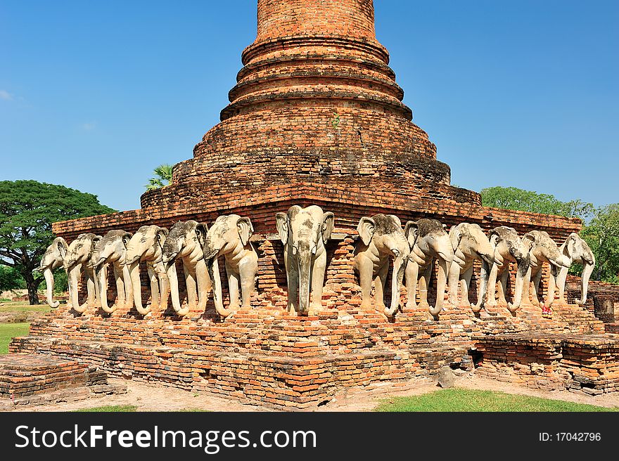 Elephant statue around pagoda at Sukhothai historical park