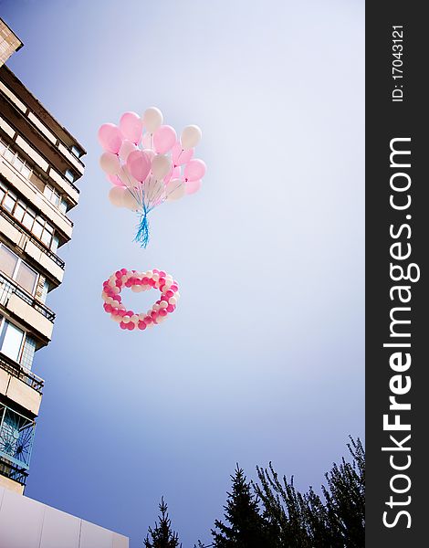 Heart of flying pink and white balloons. Heart of flying pink and white balloons