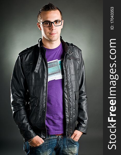 Attractive man with glasses and leather jacket