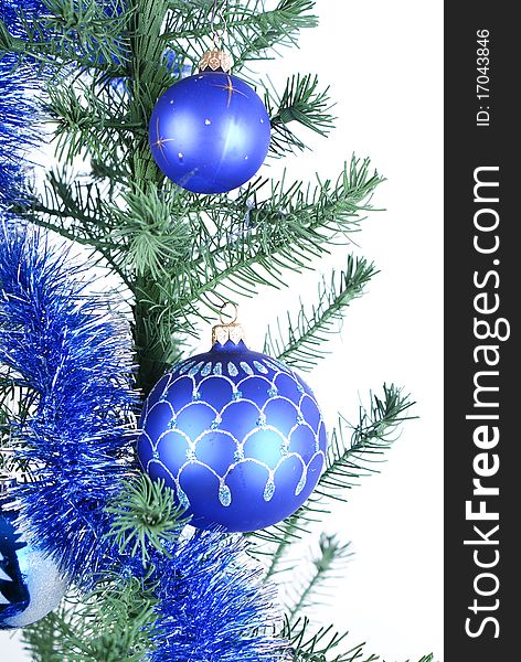 Two blue christmas ball in a christmas tree. Two blue christmas ball in a christmas tree