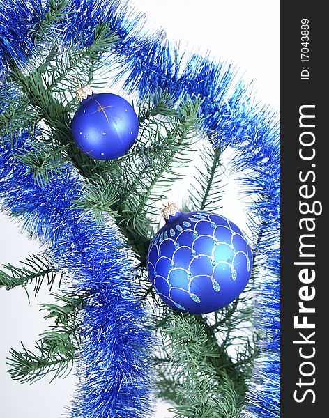 Two blue christmas ball on a christmas tree. Two blue christmas ball on a christmas tree