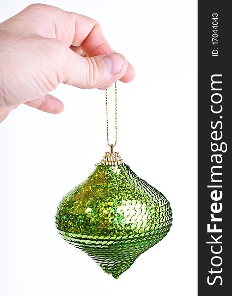 Green Christmas ball isolated over white background