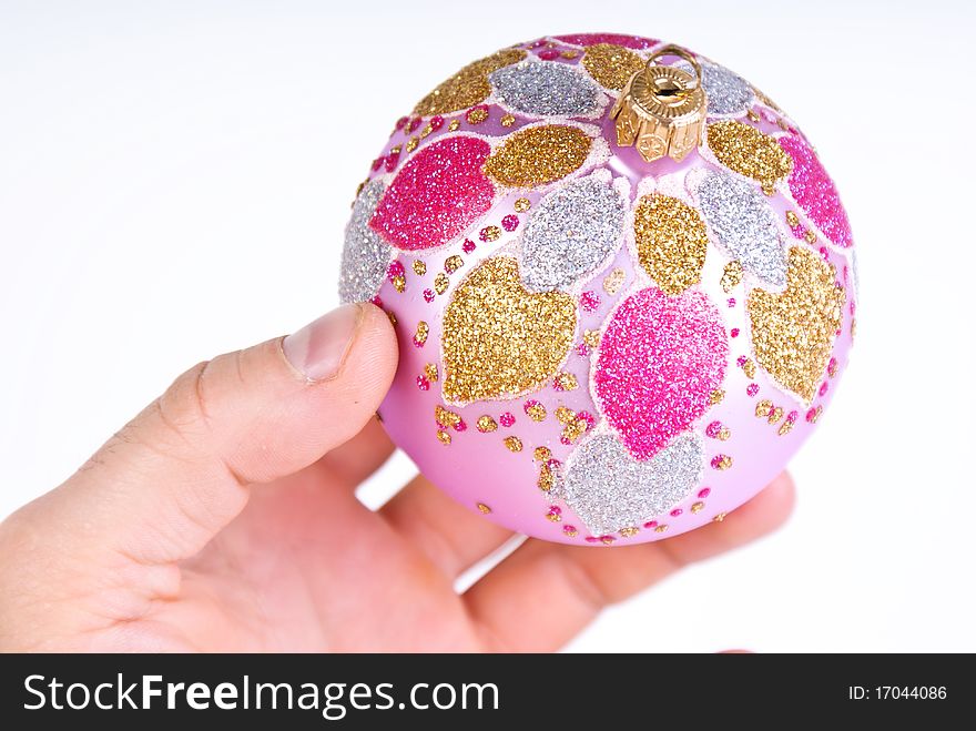 Christmas single pink decoration ball in hand