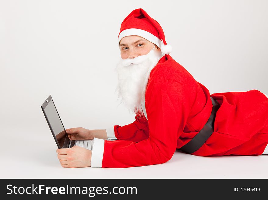 Santa Claus with a laptop. Santa Claus with a laptop