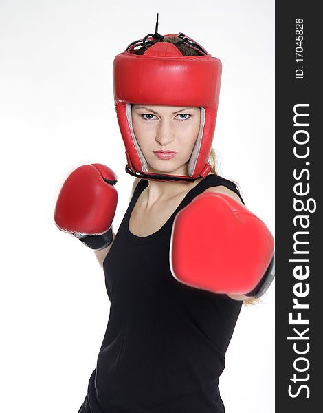 Attractive female boxer over white