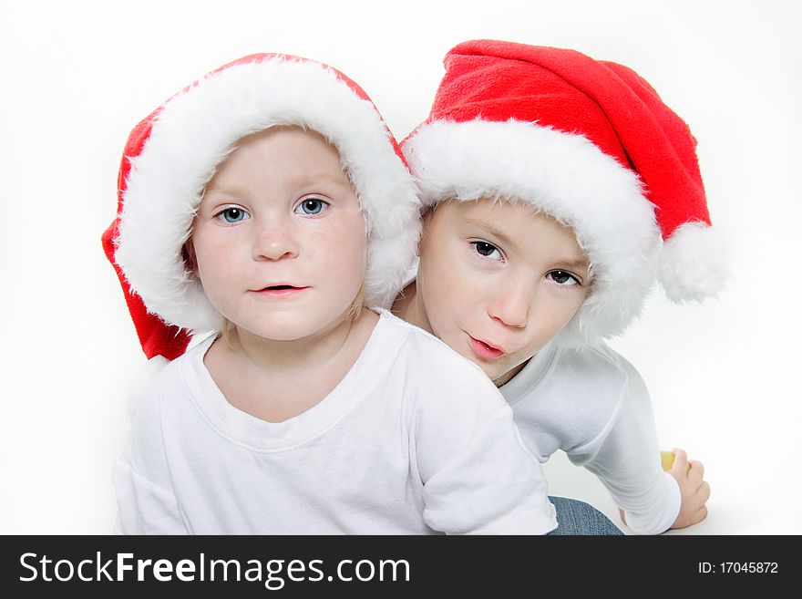 Two cute santa helpers over white. Two cute santa helpers over white