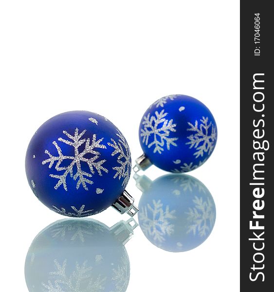 Close-up christmas decorations with reflection, isolated on white