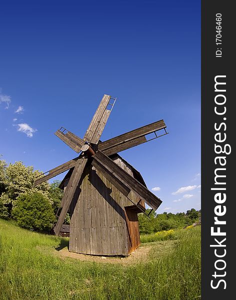 Windmill on green field from Ukraine