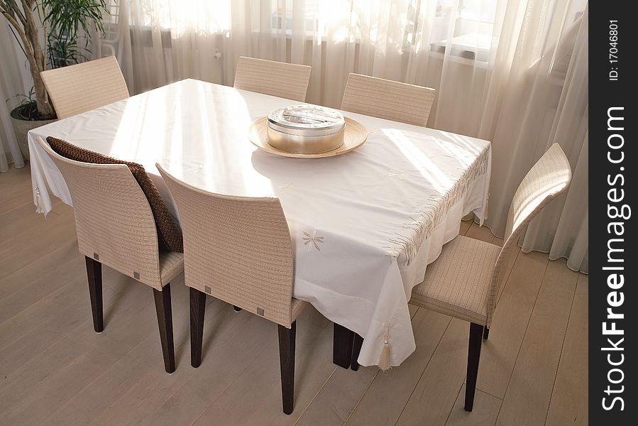 Interior of a dinning room with dinning table