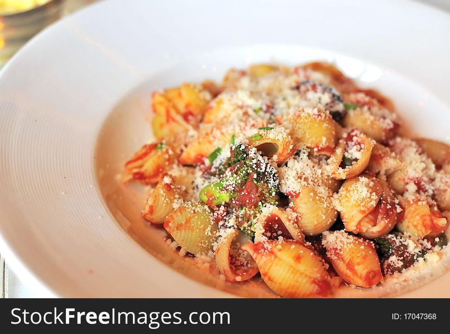 Tomato base spaghetti with cheese