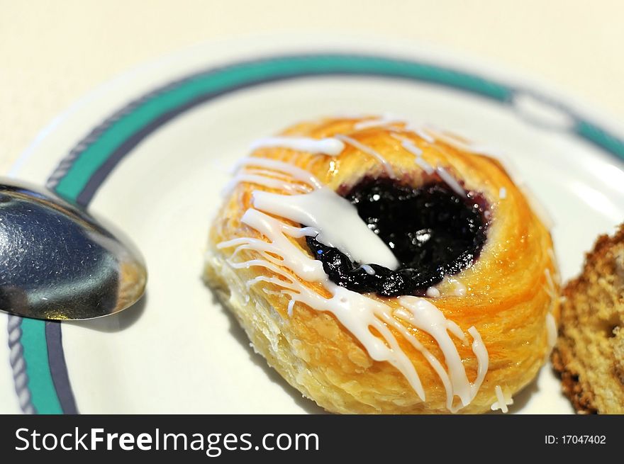 Delicious looking blueberry danish for a snack. Delicious looking blueberry danish for a snack.