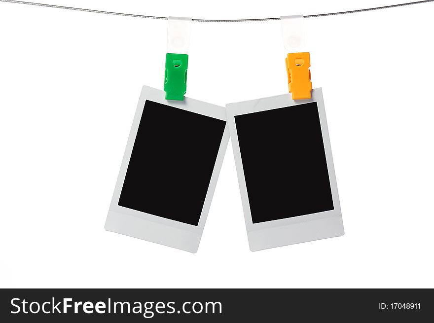 Blank instant photo prints on a washing line