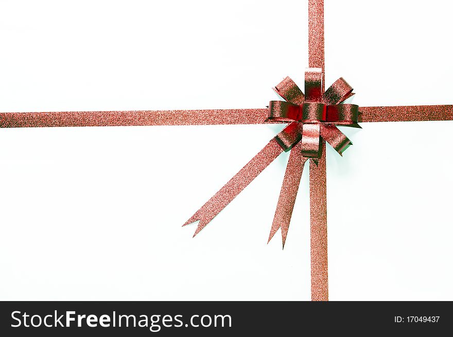 Big red holiday bow on white. Big red holiday bow on white