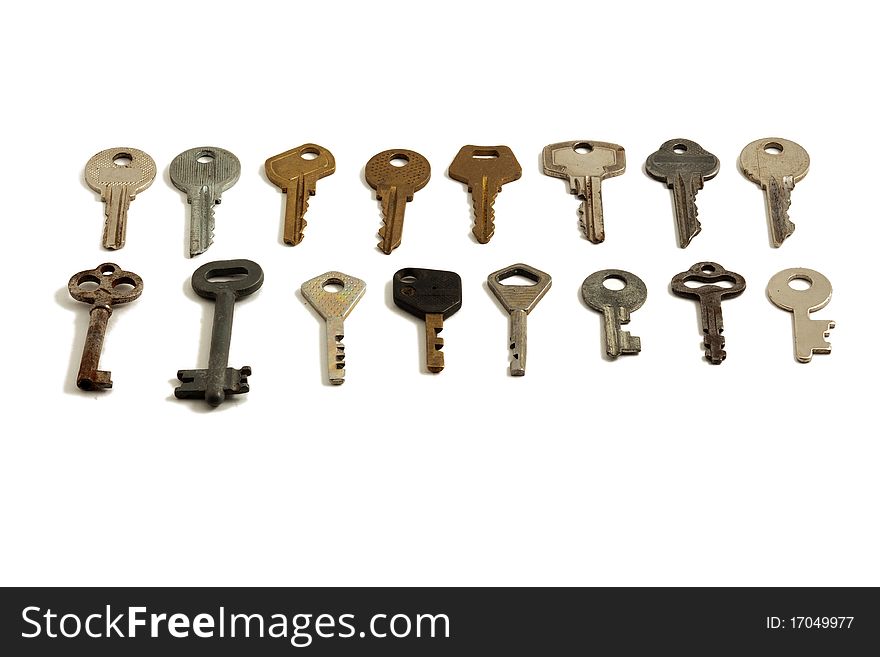 Lots Of Old Keys On White Background