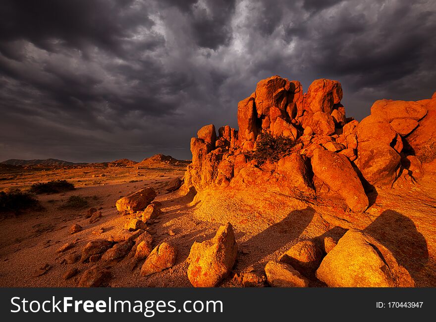 Dramatic sunset scene in Gobi stone desert, Mongolia