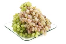 Green And Pink Grapes On A Plate. Royalty Free Stock Photography