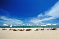 Beach Chairs With Umbrellas Stock Image