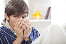 Sick Man Drinking Tea Stock Photography